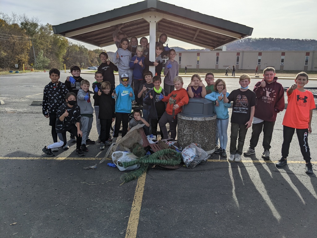 The 5th graders participated in the 1st ever "Call to Earth Day" by cleaning up the ditch.