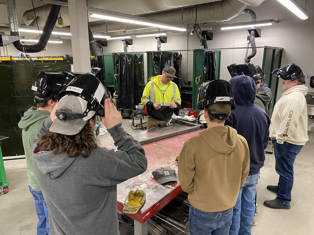 WB with students doing a welding demonstration